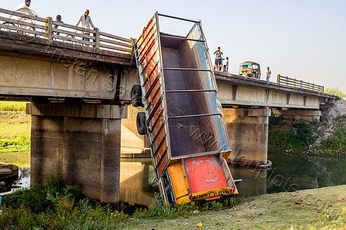 truck hanging off bridge - traffic accident (india), bridge, crash, crushed, hanging, india, lorry, overpass, river, road, tata motors, traffic accident, truck accident, west bengal, wreck