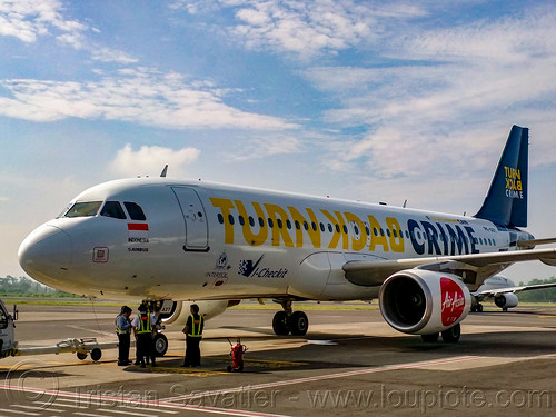 turn back crime - air asia airbus a320-216 pk-axy at jogjakarta airport, air asia, airbus a320, airport, livery, plane, tarmac