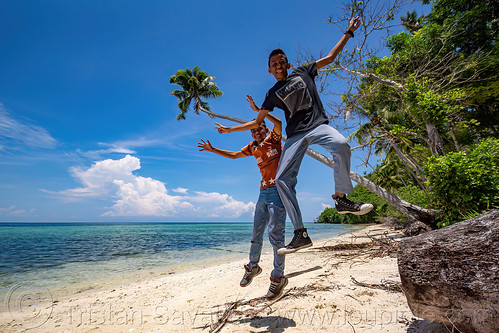 two indonesian boys jumping on the beach, beach, boys, coconut tree, jumpshot, kids, overhanging, pantai, sea