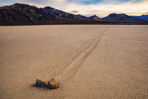 two sailing stones with parallel paths - racetrack - death valley, cracked mud, death valley, dry lake, dry mud, landscape, mountains, parallel, racetrack playa, sailing stones, sliding rocks