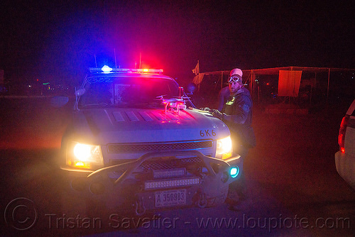 unauthorized drone confiscated by law enforcement - burning man 2015, 6k6, blm, bureau of land management, burning man, car, cop, drone, glowing, law enforcement, leo, multicopter, night, officer, police, quadcopter, quadrocopter, quadrotor helicopter, rc, remote controlled, uav, unmaned aerial vehicle