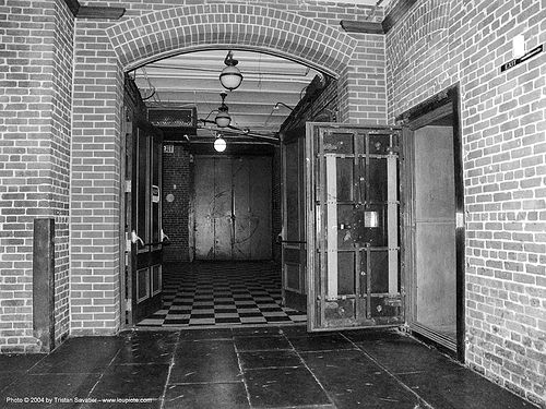 underground vaults in basement, armored doors, basement, brick walls, san francisco old mint, vaults