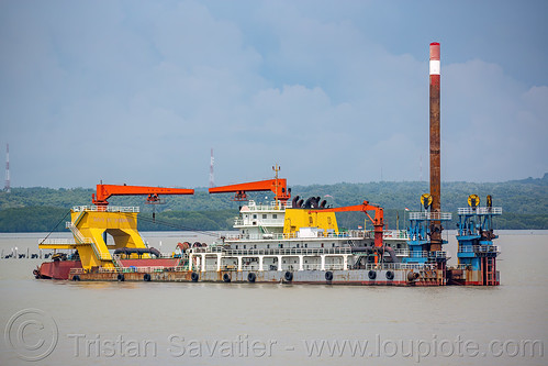 utility barge planting a metal pile in the sea floor, boat, cai jun 1, cargo ship, madura strait, merchant ship, surabaya