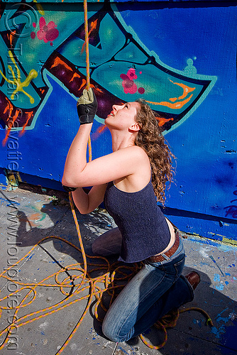 valerie pulling rope - graffiti wall, defenestration building, graffiti, rope access, ropework, valerie, woman