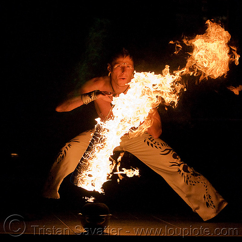 vatra spinning fire ropes - fire performer - temple of poi 2009 fire dancing expo - union square (san francisco), fire dancer, fire dancing expo, fire performer, fire spinning, man, night, spinning fire, temple of poi, vatra