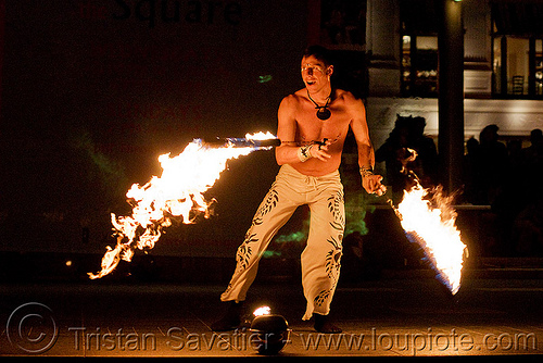 vatra spinning fire ropes - fire performer - temple of poi 2009 fire dancing expo - union square (san francisco), fire dancer, fire dancing expo, fire performer, fire spinning, man, night, spinning fire, temple of poi, vatra