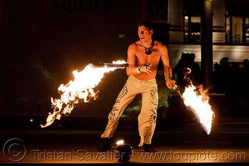 vatra spinning fire ropes - fire performer - temple of poi 2009 fire dancing expo - union square (san francisco), fire dancer, fire dancing expo, fire performer, fire spinning, man, night, spinning fire, temple of poi, vatra[an error occurred while processing this directive]