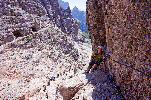 via ferrata - monte paterno, alps, cliff, climber, climbing harness, climbing helmet, dolomites, monte paterno, mountain climbing, mountaineer, mountaineering, mountains, parco naturale dolomiti di sesto, rock climbing, trail, vertical, via ferrata, woman