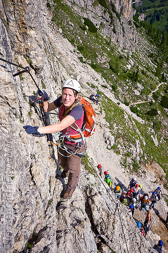 via ferrata tridentina - rock climbers, alps, cliff, climber, climbing harness, climbing helmet, dolomites, dolomiti, ferrata tridentina, mountain climbing, mountaineer, mountaineering, mountains, rock climbing, vertical, via ferrata brigata tridentina, woman