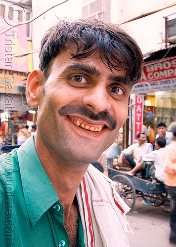 wallah with red teeth caused by chewing areca nut - betel nut teeth - delhi (india), betel leaf, betel nut, betel quids, betelnut teeth, delhi, indian man, red gums, wallah