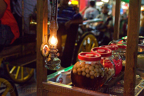 wedang ronde - javaneese sweet desert, dessert, food cart, ginger tea, glass jars, malioboro, night, oil lamp, petrol lamp, rice balls, street food, street seller, wedang ronde