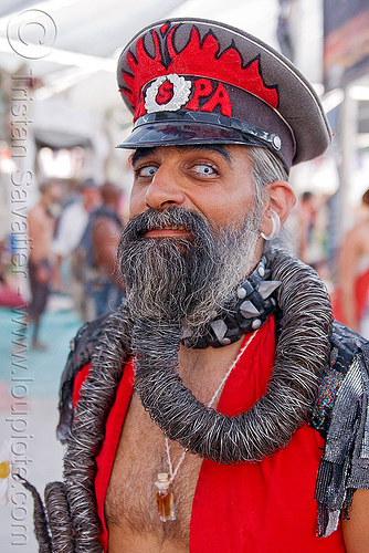 weird beard, beard, burning man, color contact lenses, contacts, military cap, military hat, red, special effects contact lenses, steven raspa, theatrical contact lenses, white contact lenses