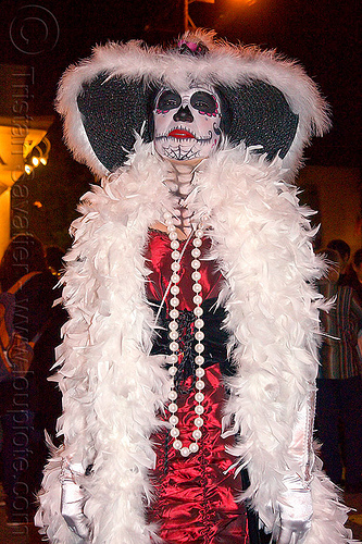 white feather boa - sugar skull makeup, black hat, day of the dead, dia de los muertos, face painting, facepaint, halloween, night, red dress, sugar skull makeup, white beads necklace, white feather boa, white gloves, woman