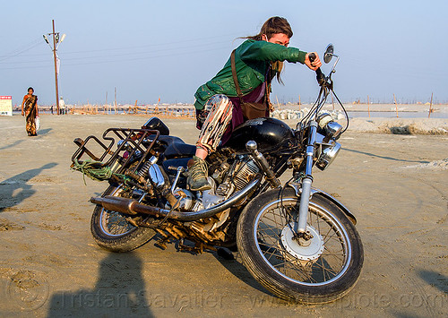 woman riding royal enfield bullet thunderbird motorcycle, 350cc, bun bun, falling, hindu pilgrimage, hinduism, kumbh mela, motorcycle touring, motorcyclist, rider, riding, royal enfield bullet, thunderbird, woman