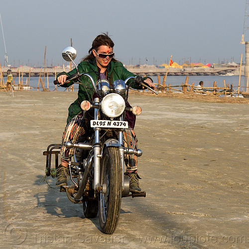 woman riding royal enfield bullet thunderbird motorcycle, 350cc, bun bun, ganga, ganges river, hindu pilgrimage, hinduism, kumbh mela, motorcycle touring, motorcyclist, rider, riding, royal enfield bullet, thunderbird, woman