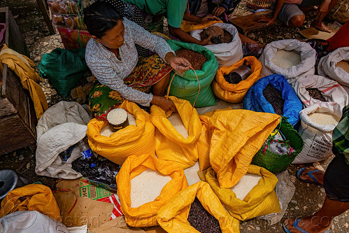 woman selling rice - rice stand on street market, bolu market, pasar bolu, rantepao, rice bags, rice merchant, rice shop, seller, sitting, tana toraja, vendor, woman