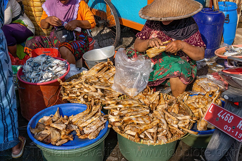 woman selling smoked fish meat at fish market, fish market, pasar pabean, seafood, smoked fish, street seller, surabaya