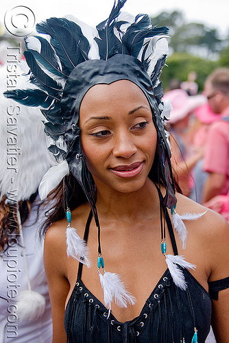 woman with black and white feather headdress, american indian costume, bay to breakers, feather headdress, footrace, native american costume, snow bunnies, street party, woman