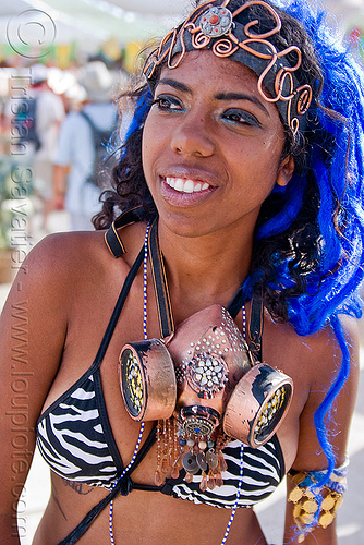 woman with decorated dust mask, 3m respirator, attire, blue wig, burning man outfit, decorated dust mask, decorated respirator, dreadfalls, head band, woman