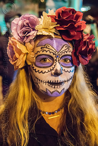 woman with purple and white sugar skull makeup and flower headdress - dia de los muertos, day of the dead, dia de los muertos, face painting, facepaint, flower headdress, flowers, halloween, neckless, night, purple, sugar skull makeup, woman