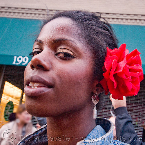 woman with red flower in hair - how weird street faire (san francisco), african american woman, black woman, red flower, red rose, rose flower