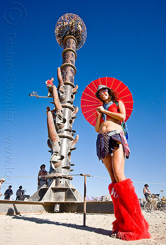 woman with red japanese umbrella near the minaret tower, art installation, burning man, japanese umbrella, red umbrella, the minaret, tower, woman