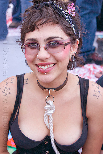 woman with rope collar - star shoulder tattoos (san francisco), emma, eris, gouged ears, piercing, shoulder tattoo, stars tattoo, woman