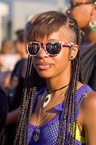 woman with shaved hair on the sides, braid, braided hair, gay pride, hair extensions, sunglasses, woman