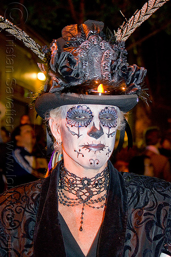 woman with sugar skull makeup and victorian costume, black necklace, black outfit, cameragirl, day of the dead, decorated hat, dia de los muertos, face painting, facepaint, feathers, halloween, heather, lace, night, stovepipe hat, sugar skull makeup, victorian costume, victorian outfit, woman