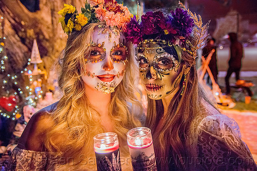 women with beautiful sugar skull makeup - dia de los muertos, andrea, bindis, candle light, candles, day of the dead, dia de los muertos, face painting, facepaint, flower headdress, flowers, halloween, mariana, night, sugar skull makeup, women