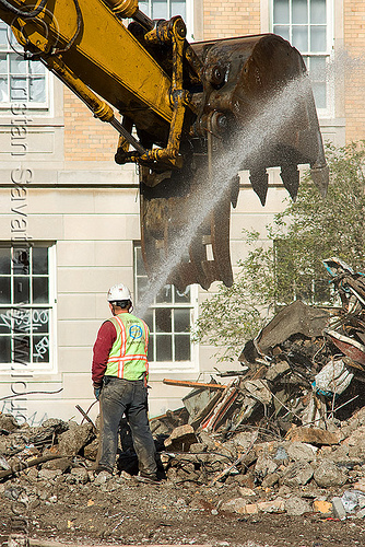 worker near excavator bucket - building demolition, abandoned building, abandoned hospital, at work, bucket attachment, building demolition, construction worker, excavator bucket, excavators, man, presidio hospital, presidio landmark apartments, rubble, water spray, working