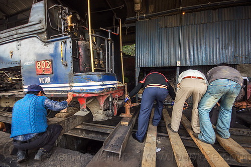 workers using mechanical lift to raise steam locomotive - darjeeling (india), 802 victor, 902, darjeeling himalayan railway, darjeeling toy train, lift, lifting, men, narrow gauge, railroad, steam engine, steam locomotive, steam train engine, train depot, train yard, workers, working