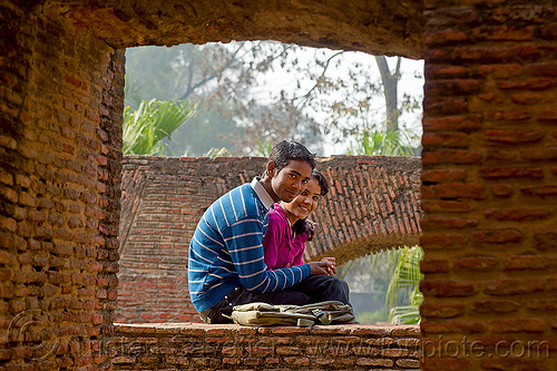 young indian couple in residency ruins - lucknow (india), brick vault, brick wall, british residency, lovers, lucknow, man, ruins, sitting, woman