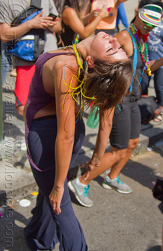 young woman bending backward, ariana, bending backward, dancing, feather earrings, gay pride festival, woman