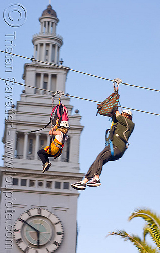 zip-line over san francisco, adventure, blue sky, cable line, cables, campanil, climbing helmet, clock tower, embarcadero tower, ferry building, hanging, mountaineering, moving fast, speed, steel cable, trolley, tyrolienne, urban, zip line, zip wire