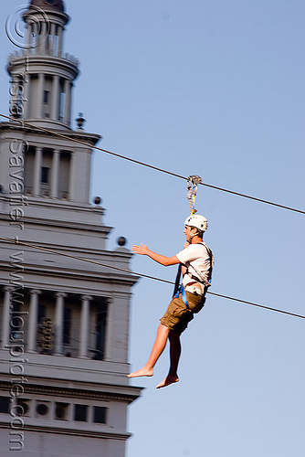 zip-line over san francisco, adventure, blue sky, cable line, cables, campanil, climbing helmet, clock tower, embarcadero tower, ferry building, hanging, mountaineering, moving fast, speed, steel cable, trolley, tyrolienne, urban, zip line, zip wire