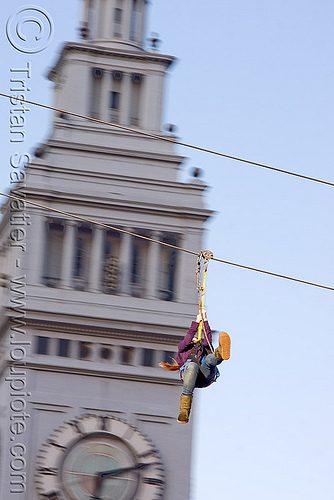 zip-line over san francisco, adventure, blue sky, cable line, cables, campanil, climbing helmet, clock tower, embarcadero tower, ferry building, hanging, mountaineering, moving fast, speed, steel cable, trolley, tyrolienne, urban, zip line, zip wire