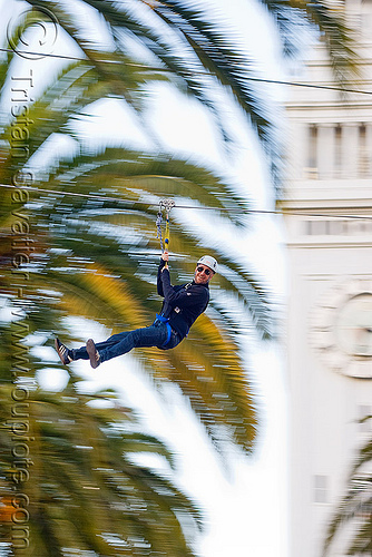 zip-line over san francisco, adventure, cable line, cables, campanil, climbing helmet, clock tower, embarcadero tower, ferry building, hanging, mountaineering, moving fast, palm trees, speed, steel cable, trolley, tyrolienne, urban, zip line, zip wire