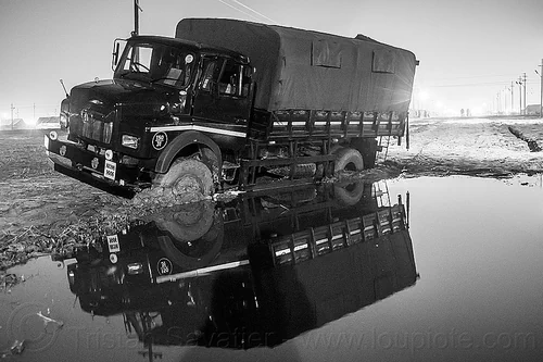 army truck stuck in mud (india), 4x4 trucks, all-terrain, army trucks, hindu pilgrimage, hinduism, indian army, kumbh mela, lorry, military trucks, mud, muddy, night, tata motors, truck