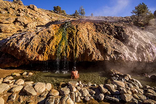 bathing in buckeye hot springs (california), bath, bathing, buckeye hot springs, california, concretions, dripping, eastern sierra, nude, pool, rocks, smoke, smoking, steam, travertine, woman