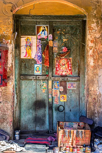 blue door decorated with posters of hindu deities and gurus (india), blue door, closed, deities, hindu, hinduism, posters, varanasi