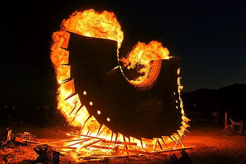 burning art, burning man at night, fire, wood, zark!