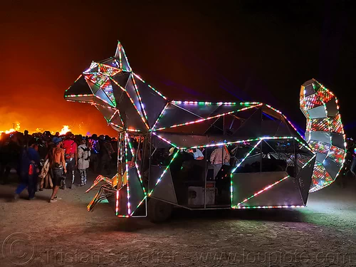 burning man - cat art car, burning man art cars, burning man at night, cat art car, mutant vehicles, unidentified art car