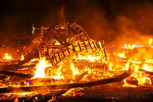 burning man - giant gears in the man fire embers, burning man at night, fire, night of the burn, the man