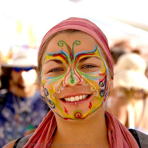 burning man - italian burner with face paint, face painting, facepaint, makeup, painted, rainbow colors, woman