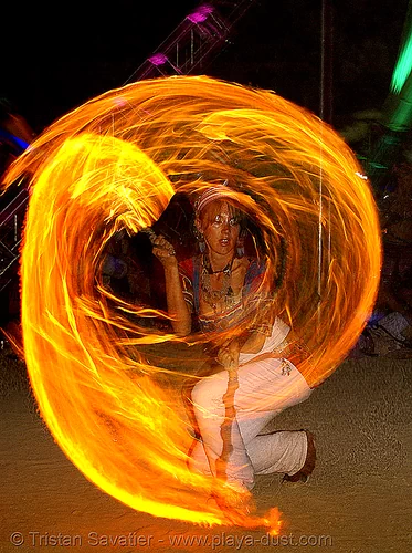 burning man - maqi aka lauraleye spinning fire, burning man at night, fire dancer, fire dancing, fire performer, fire spinning, hilauraly, lauraleye, maqi, spinning fire