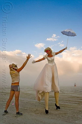 burning man - stilts performer - jesster, attire, burning man outfit, circus metropolus, jessica, jesster, stilts, stiltwalker, stiltwalking, umbrella