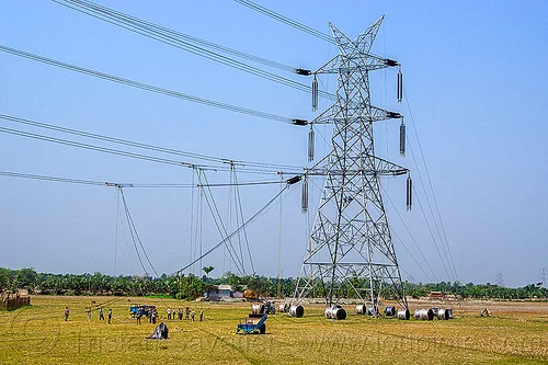 cable riggers installing power lines on transmission tower (india), cable riggers, cable wheels, cables, construction, electric line, electricity pylons, electricity transmission towers, high voltage, men, power line, power transmission lines, pulleys, pylon, rigging, ropes, wires, workers