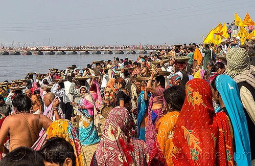 clay shiva linga's offering ceremony - kumbh mela (india), carrying on the head, clay, crowd, ganga, ganges river, hindu ceremony, hindu pilgrimage, hinduism, kumbh mela, lingams, offerings, river bank, shiva linga, shiva lingam, shivling, trays, walking