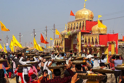 clay shiva lingam's ceremony and procession - kumbh mela (india), ashram, carrying on the head, clay, crowd, gate, hindu ceremony, hindu pilgrimage, hinduism, kumbh mela, lingams, offerings, shiva linga, shiva lingam, shivling, trays, walking, yellow flags